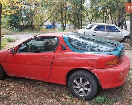 Красный Мазда МХ-3, объемом двигателя 1.6 л и пробегом 250 тыс. км за 1300 $, фото 1 на Automoto.ua