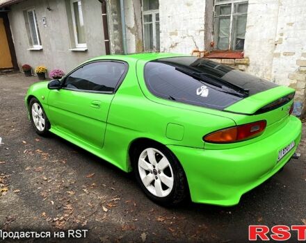 Зелений Мазда МХ-3, об'ємом двигуна 1.6 л та пробігом 0 тис. км за 2700 $, фото 3 на Automoto.ua