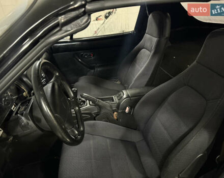 Черный Мазда МХ-5, объемом двигателя 1.6 л и пробегом 129 тыс. км за 12000 $, фото 2 на Automoto.ua