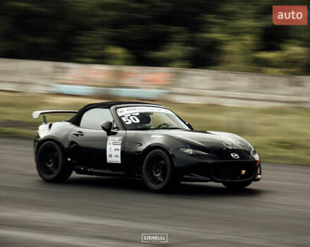 Чорний Мазда МХ-5, об'ємом двигуна 2 л та пробігом 79 тис. км за 17500 $, фото 1 на Automoto.ua