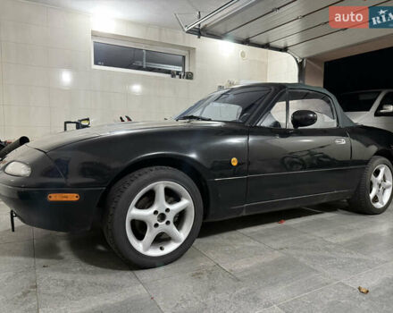 Мазда МХ-5 1995 в Ровно на Automoto.ua Черный Мазда МХ-5, объемом двигателя 1.6 л и пробегом 129 тыс. км за 12000 $, фото 1 на Automoto.ua