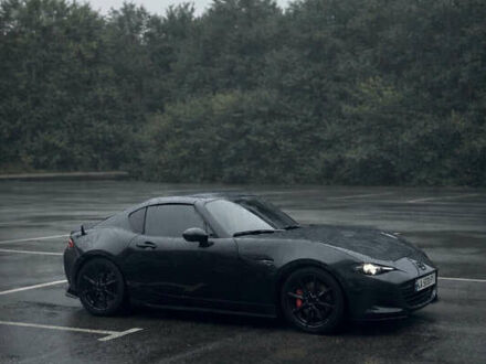 Черный Мазда МХ-5, объемом двигателя 2 л и пробегом 30 тыс. км за 30500 $, фото 1 на Automoto.ua