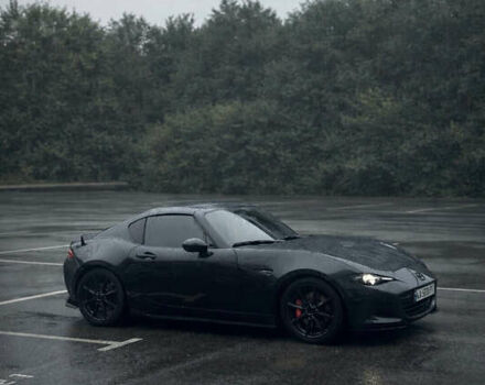 Черный Мазда МХ-5, объемом двигателя 2 л и пробегом 30 тыс. км за 30500 $, фото 1 на Automoto.ua