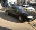 Чорний Мазда МХ-6, об'ємом двигуна 2 л та пробігом 250 тис. км за 3299 $, фото 1 на Automoto.ua