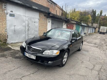 Черный Мазда Милления, объемом двигателя 2.5 л и пробегом 247 тыс. км за 4300 $, фото 1 на Automoto.ua