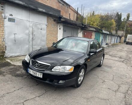 Черный Мазда Милления, объемом двигателя 2.5 л и пробегом 247 тыс. км за 4300 $, фото 1 на Automoto.ua