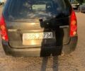 Черный Мазда Премаси, объемом двигателя 2 л и пробегом 220 тыс. км за 750 $, фото 1 на Automoto.ua