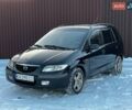 Черный Мазда Премаси, объемом двигателя 1.84 л и пробегом 435 тыс. км за 4190 $, фото 3 на Automoto.ua