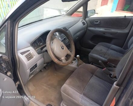 Черный Мазда Премаси, объемом двигателя 2 л и пробегом 300 тыс. км за 800 $, фото 1 на Automoto.ua