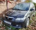 Чорний Мазда Премасі, об'ємом двигуна 1.8 л та пробігом 250 тис. км за 1201 $, фото 1 на Automoto.ua