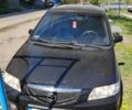 Черный Мазда Премаси, объемом двигателя 2 л и пробегом 300 тыс. км за 800 $, фото 1 на Automoto.ua