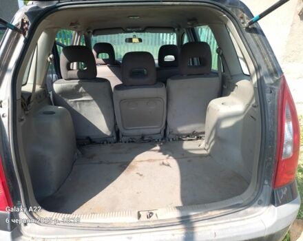 Черный Мазда Премаси, объемом двигателя 2 л и пробегом 300 тыс. км за 800 $, фото 2 на Automoto.ua