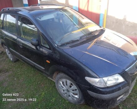 Черный Мазда Премаси, объемом двигателя 2 л и пробегом 300 тыс. км за 570 $, фото 2 на Automoto.ua