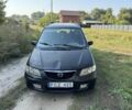 Черный Мазда Премаси, объемом двигателя 2 л и пробегом 250 тыс. км за 850 $, фото 1 на Automoto.ua