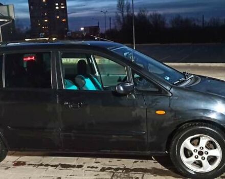 Черный Мазда Премаси, объемом двигателя 1.84 л и пробегом 259 тыс. км за 3800 $, фото 2 на Automoto.ua