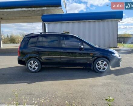 Черный Мазда Премаси, объемом двигателя 2 л и пробегом 250 тыс. км за 2850 $, фото 3 на Automoto.ua