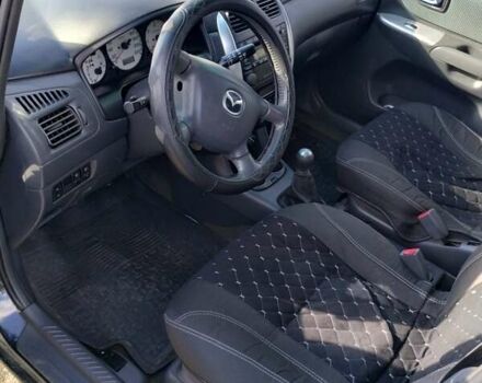 Черный Мазда Премаси, объемом двигателя 2 л и пробегом 250 тыс. км за 2850 $, фото 5 на Automoto.ua