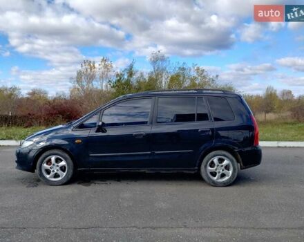 Черный Мазда Премаси, объемом двигателя 2 л и пробегом 250 тыс. км за 2850 $, фото 1 на Automoto.ua