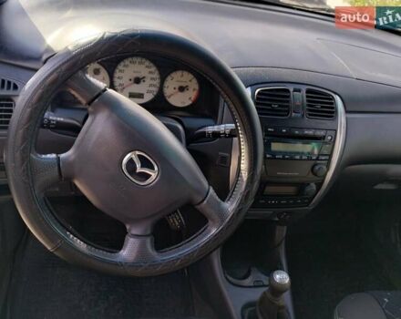 Черный Мазда Премаси, объемом двигателя 2 л и пробегом 250 тыс. км за 2850 $, фото 6 на Automoto.ua