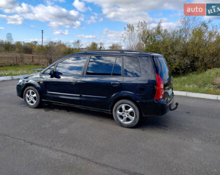 Черный Мазда Премаси, объемом двигателя 2 л и пробегом 250 тыс. км за 2850 $, фото 2 на Automoto.ua