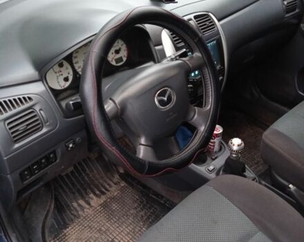 Черный Мазда Премаси, объемом двигателя 2 л и пробегом 246 тыс. км за 1069 $, фото 3 на Automoto.ua