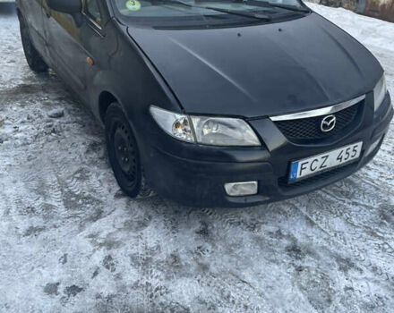 Черный Мазда Премаси, объемом двигателя 1.99 л и пробегом 378 тыс. км за 1400 $, фото 1 на Automoto.ua