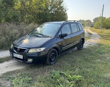 Черный Мазда Премаси, объемом двигателя 2 л и пробегом 250 тыс. км за 850 $, фото 1 на Automoto.ua