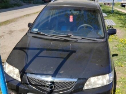 Черный Мазда Премаси, объемом двигателя 2 л и пробегом 300 тыс. км за 800 $, фото 1 на Automoto.ua