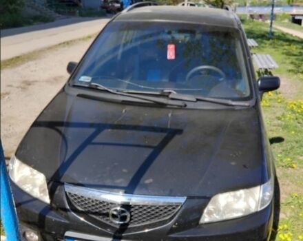 Черный Мазда Премаси, объемом двигателя 2 л и пробегом 300 тыс. км за 800 $, фото 1 на Automoto.ua