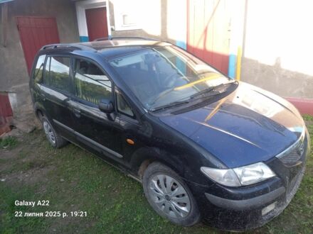 Черный Мазда Премаси, объемом двигателя 2 л и пробегом 300 тыс. км за 570 $, фото 1 на Automoto.ua