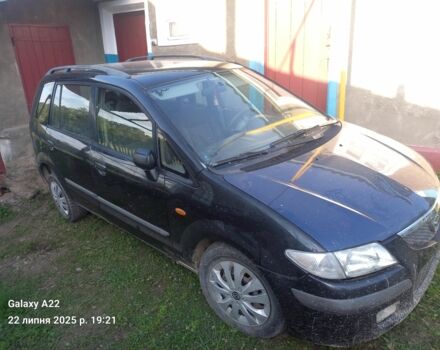 Черный Мазда Премаси, объемом двигателя 2 л и пробегом 300 тыс. км за 570 $, фото 1 на Automoto.ua