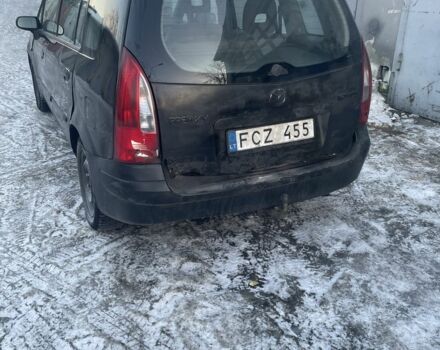 Черный Мазда Премаси, объемом двигателя 2 л и пробегом 378 тыс. км за 1400 $, фото 1 на Automoto.ua