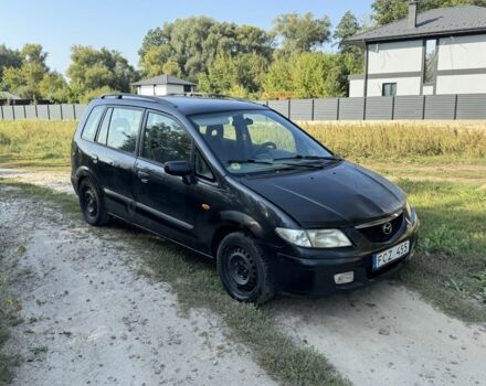 Черный Мазда Премаси, объемом двигателя 2 л и пробегом 250 тыс. км за 850 $, фото 1 на Automoto.ua