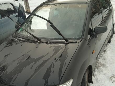 Черный Мазда Премаси, объемом двигателя 2 л и пробегом 244 тыс. км за 1064 $, фото 1 на Automoto.ua