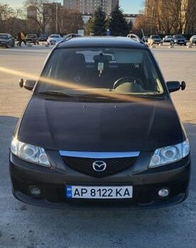 Черный Мазда Премаси, объемом двигателя 2 л и пробегом 302 тыс. км за 4000 $, фото 1 на Automoto.ua
