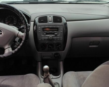 Красный Мазда Премаси, объемом двигателя 1.8 л и пробегом 343 тыс. км за 2700 $, фото 4 на Automoto.ua