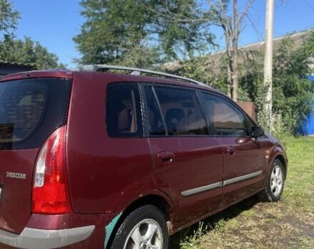 Мазда Премаси 1999 в Кицмане на Automoto.ua Красный Мазда Премаси, объемом двигателя 2 л и пробегом 348 тыс. км за 2700 $, фото 2 на Automoto.ua