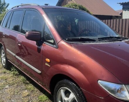 Мазда Премаси 1999 в Кицмане на Automoto.ua Красный Мазда Премаси, объемом двигателя 2 л и пробегом 348 тыс. км за 2700 $, фото 3 на Automoto.ua