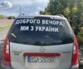 Красный Мазда Премаси, объемом двигателя 2 л и пробегом 300 тыс. км за 750 $, фото 1 на Automoto.ua