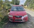 Красный Мазда Премаси, объемом двигателя 2 л и пробегом 300 тыс. км за 750 $, фото 1 на Automoto.ua