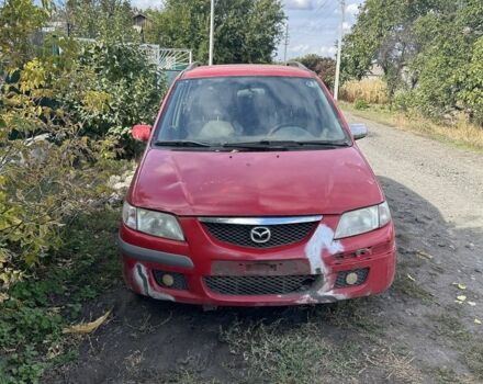 Красный Мазда Премаси, объемом двигателя 2 л и пробегом 300 тыс. км за 750 $, фото 1 на Automoto.ua