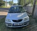 Сірий Мазда Премасі, об'ємом двигуна 1.8 л та пробігом 260 тис. км за 1797 $, фото 3 на Automoto.ua