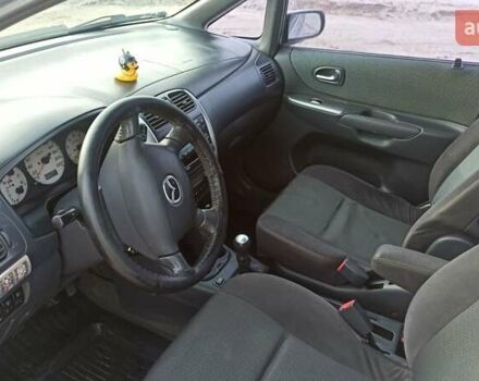 Сірий Мазда Премасі, об'ємом двигуна 1.8 л та пробігом 345 тис. км за 3080 $, фото 4 на Automoto.ua