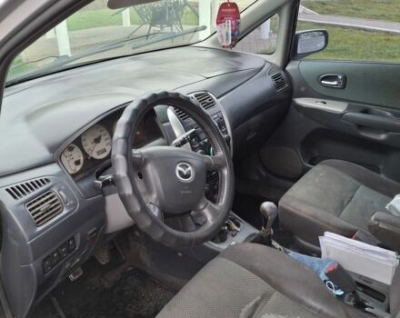 Серый Мазда Премаси, объемом двигателя 2 л и пробегом 320 тыс. км за 1650 $, фото 4 на Automoto.ua