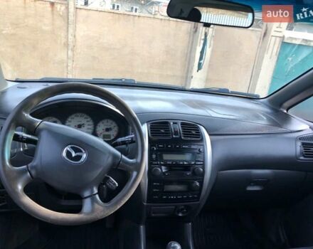 Серый Мазда Премаси, объемом двигателя 2 л и пробегом 200 тыс. км за 4000 $, фото 3 на Automoto.ua