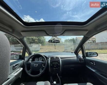 Серый Мазда Премаси, объемом двигателя 1.99 л и пробегом 217 тыс. км за 3700 $, фото 2 на Automoto.ua