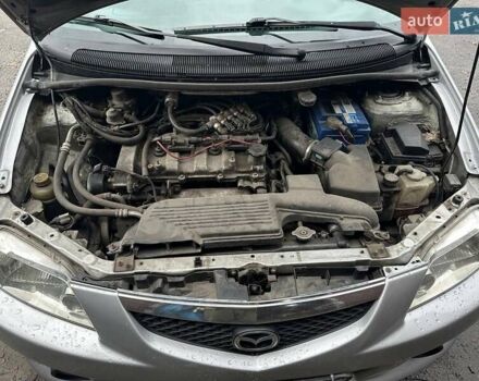 Серый Мазда Премаси, объемом двигателя 2 л и пробегом 290 тыс. км за 3800 $, фото 4 на Automoto.ua