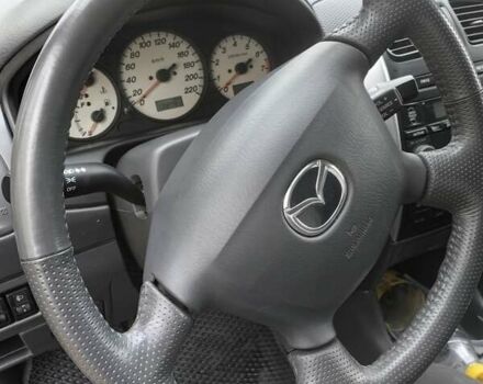 Серый Мазда Премаси, объемом двигателя 1.84 л и пробегом 137 тыс. км за 4350 $, фото 16 на Automoto.ua