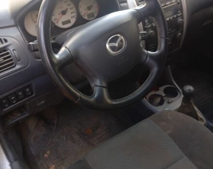 Серый Мазда Премаси, объемом двигателя 1.8 л и пробегом 120 тыс. км за 2000 $, фото 4 на Automoto.ua