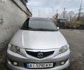 Серый Мазда Премаси, объемом двигателя 1.8 л и пробегом 397 тыс. км за 2200 $, фото 1 на Automoto.ua